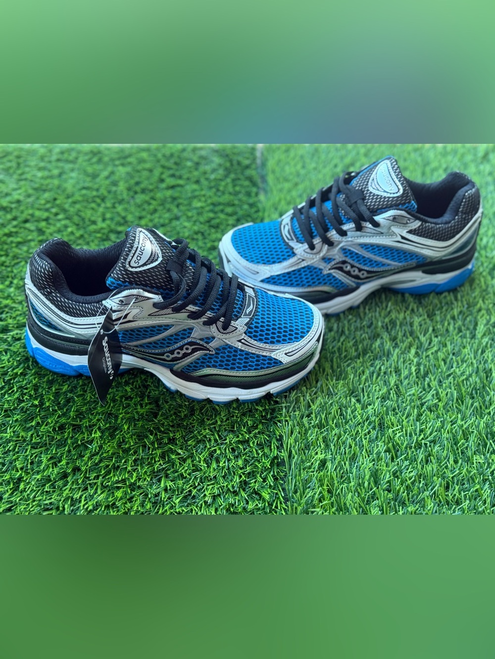 Size 8.5 Men’s And Women’s 10 - Saucony Blue and Black Mesh